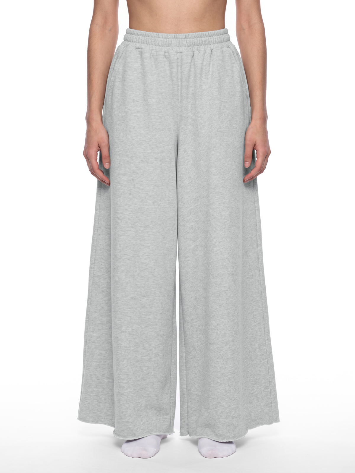 STILL. Women's Raw Edge Wide Leg Sweatpants, worn by a model