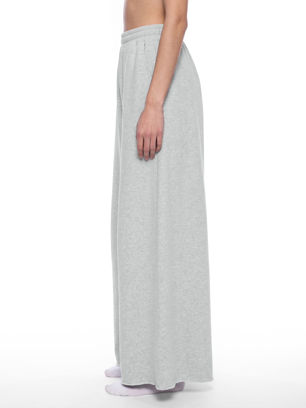 STILL. Women's Raw Edge Wide Leg Sweatpants, worn by a model