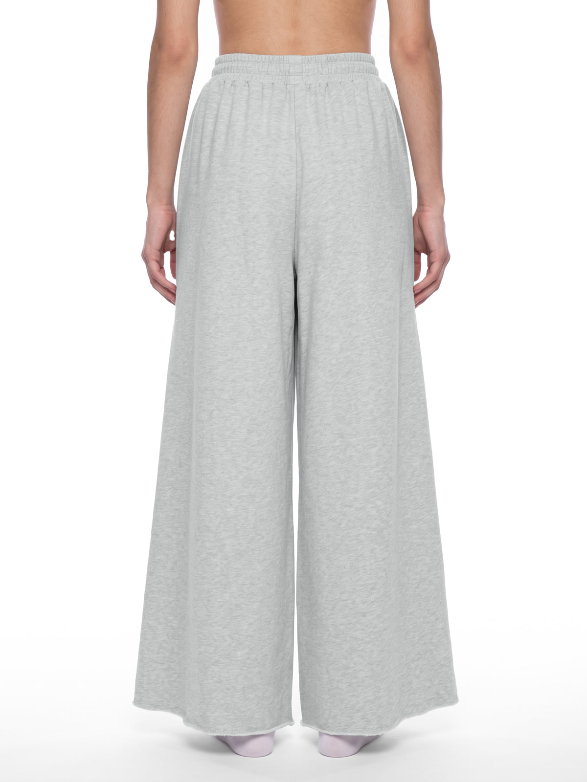 STILL. Women's Raw Edge Wide Leg Sweatpants, worn by a model
