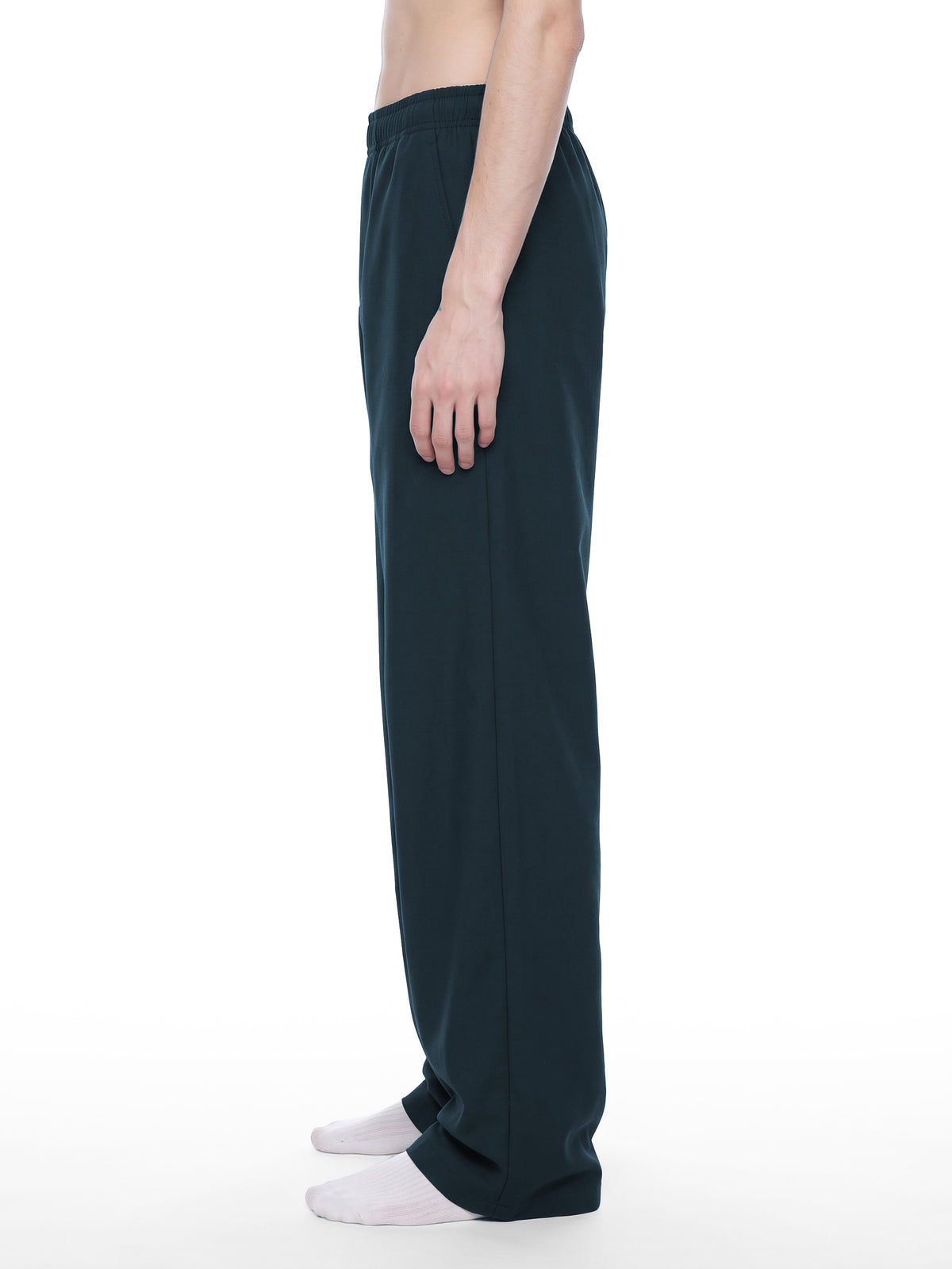 STILL. Men's Loose Straight Leg Pants, worn by a model