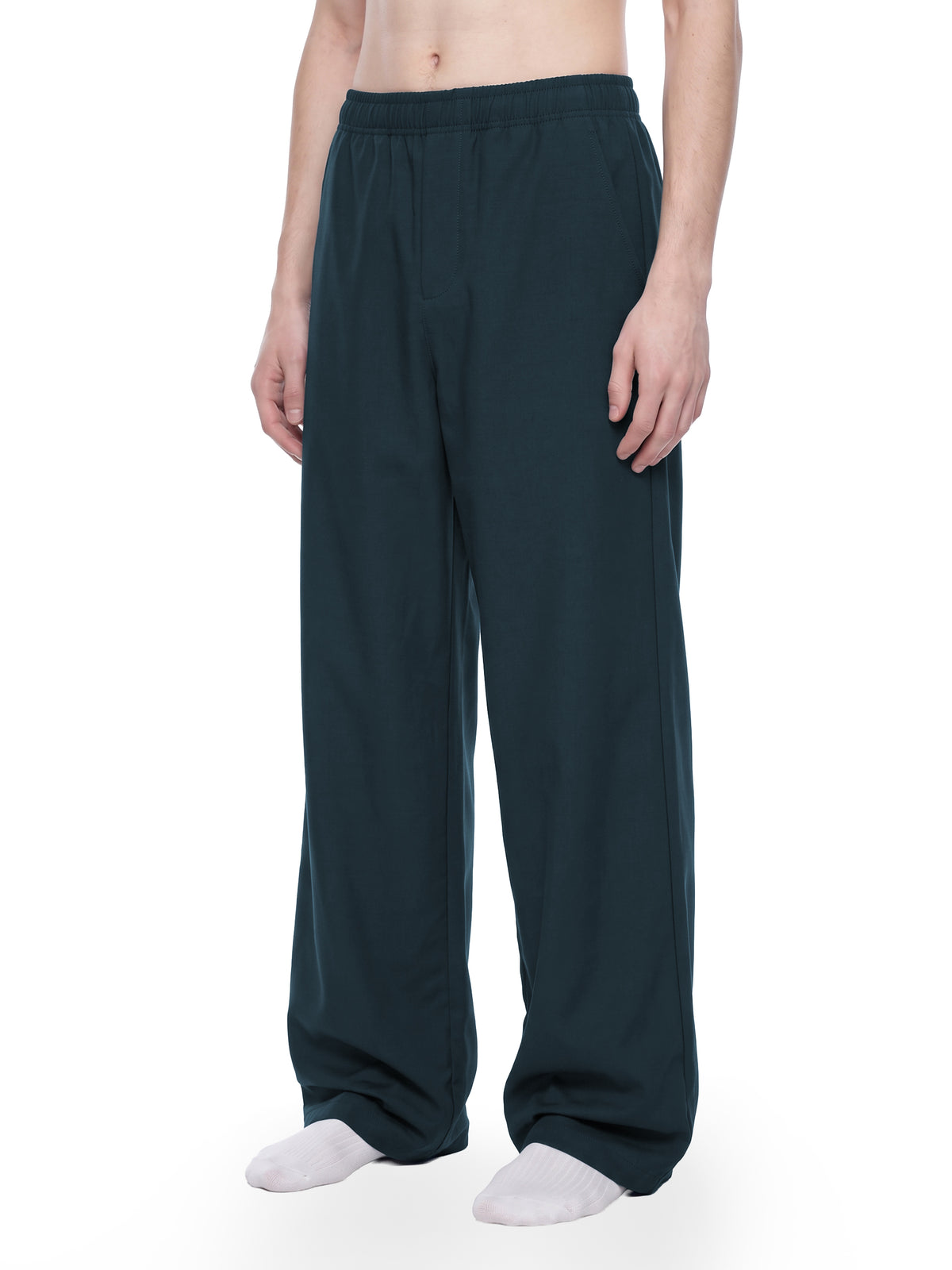 STILL. Men's Loose Straight Leg Pants, worn by a model