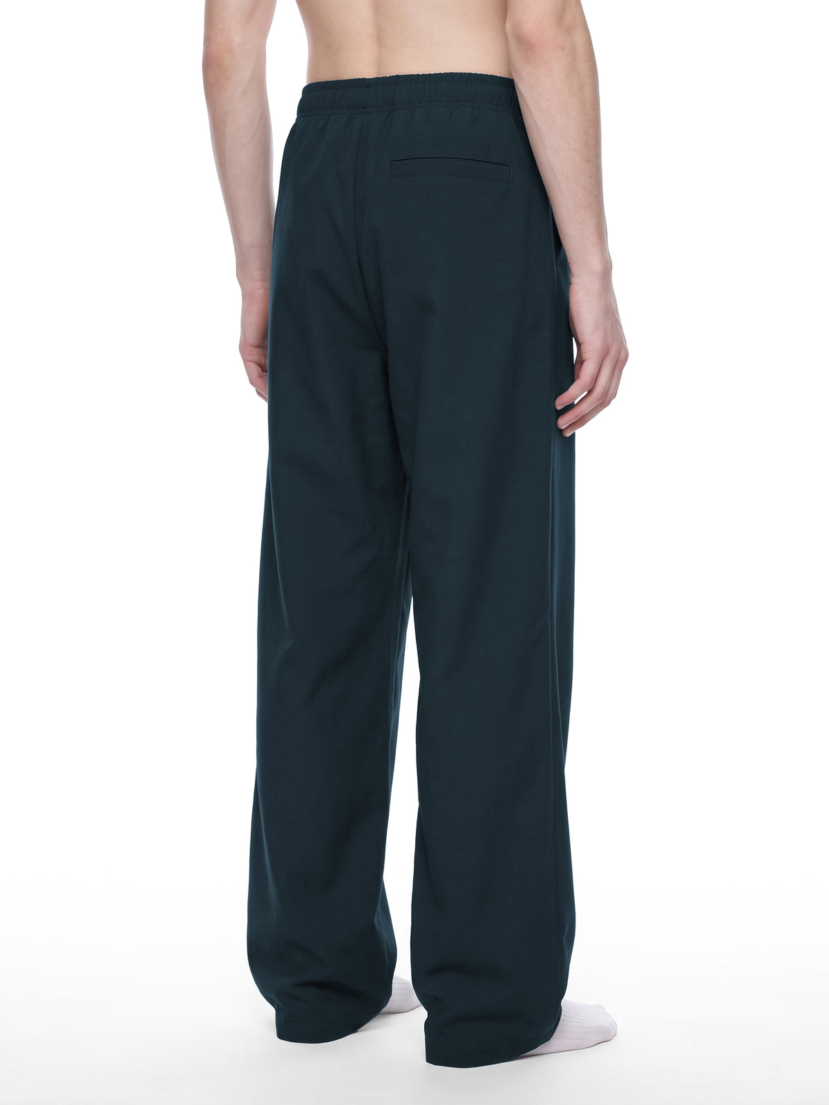 STILL. Men's Loose Straight Leg Pants, worn by a model