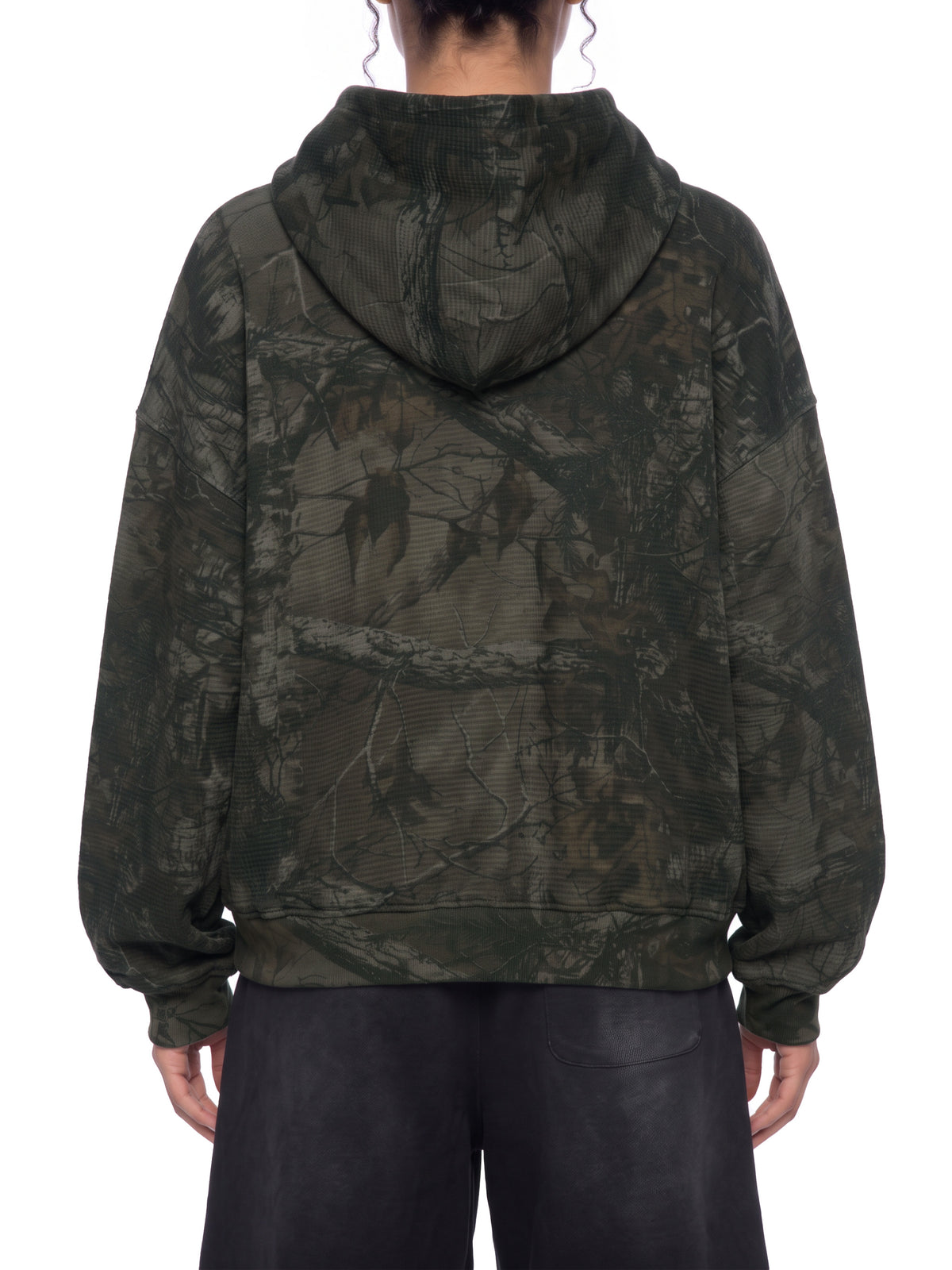 STILL. Unisex Waffle Tree Camo Boxy Hoodie, worn by a model