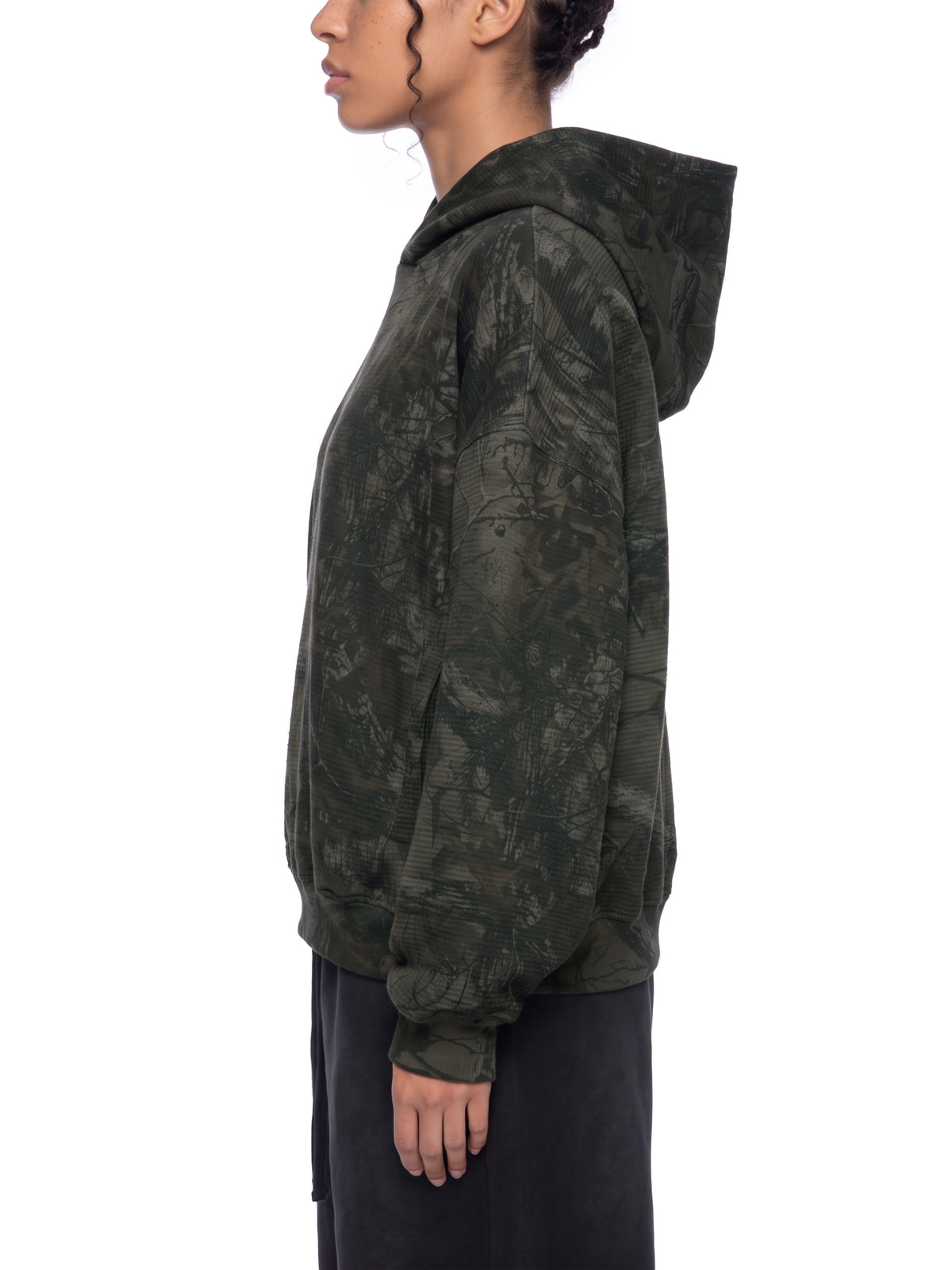 STILL. Unisex Waffle Tree Camo Boxy Hoodie, worn by a model