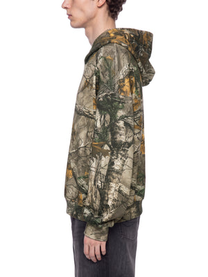 STILL. Unisex Waffle Tree Camo Boxy Hoodie, worn by a model