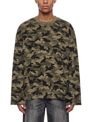 STILL. Unisex Camo Waffle Raw Edge Long Sleeve T-Shirt, worn by a model
