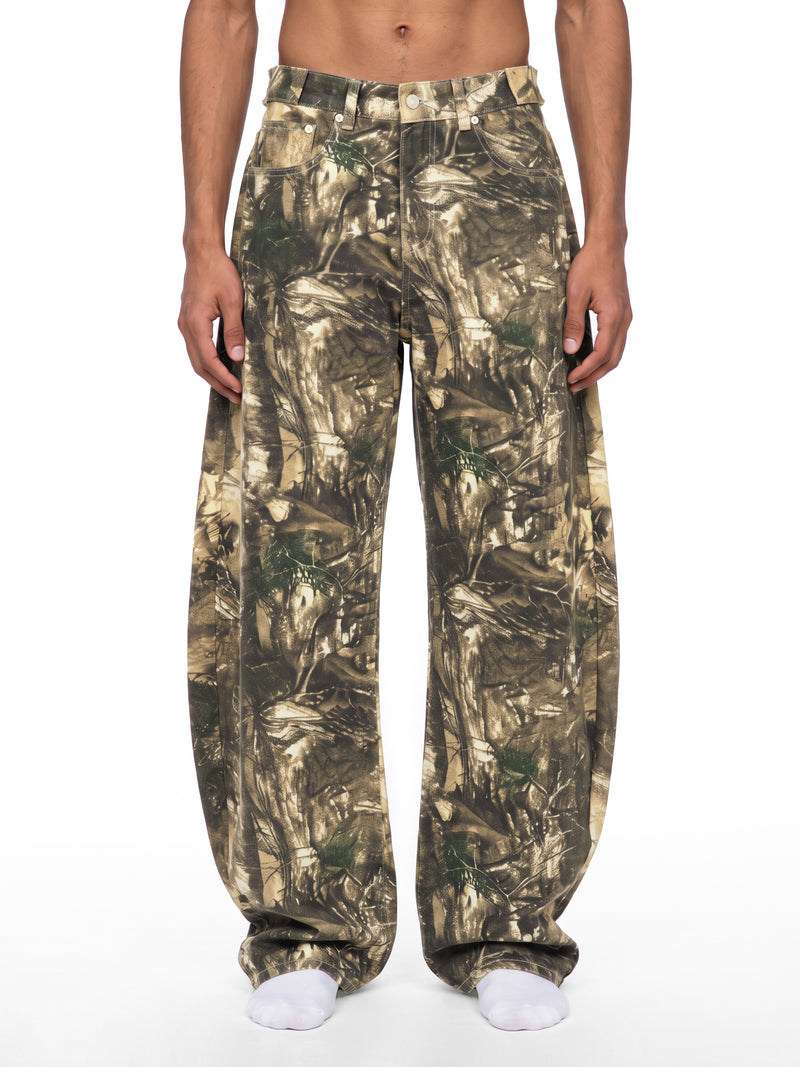 STILL. Men's Tree Camo Barrel Leg Pants, worn by a model